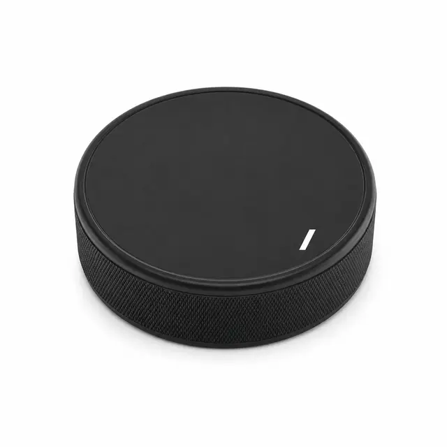 Print-on-demand hockey puck — custom printed black rubber puck in standard regulation size