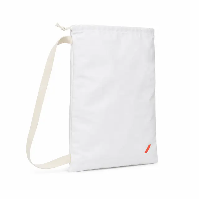 Print-on-demand laundry bag — polyester construction with drawstring closure and single compartment